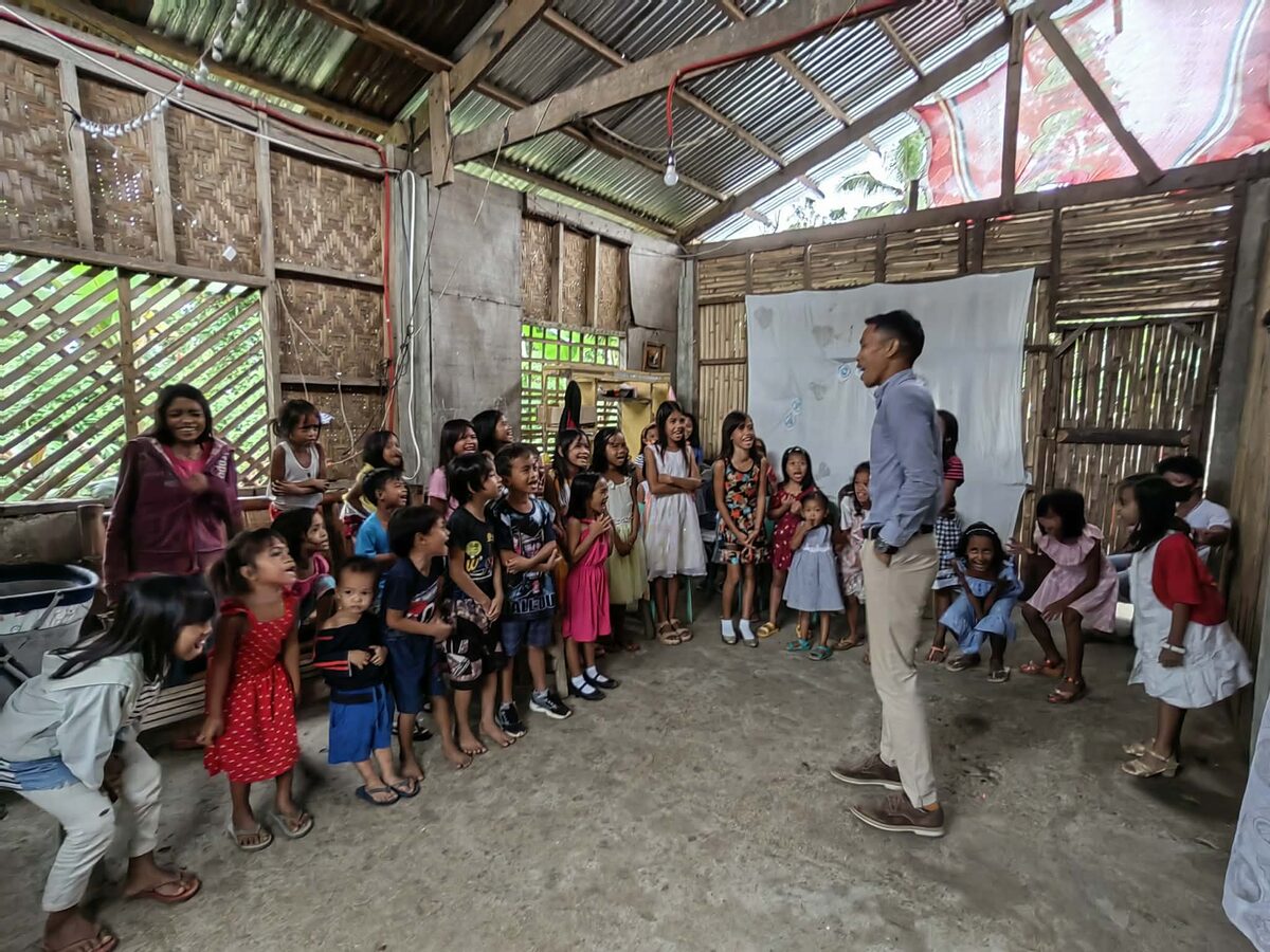 Children singing during a church anniversary activity