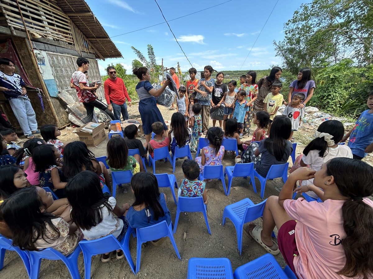 Children seated for an extension Bible class